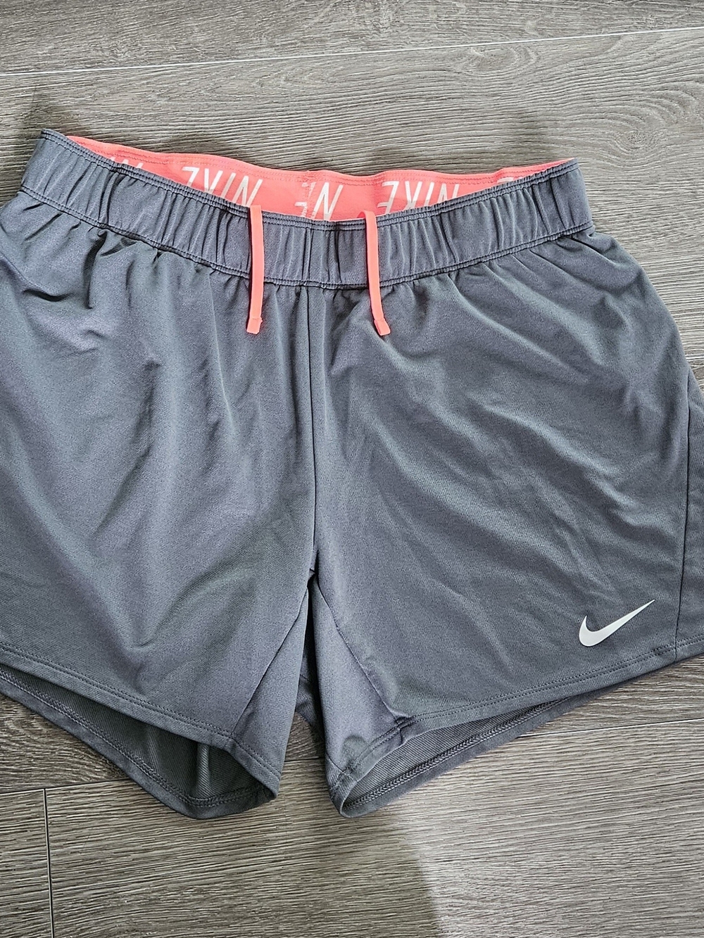 Nike Women's Gray Athletic Shorts with Pink Drawcord
